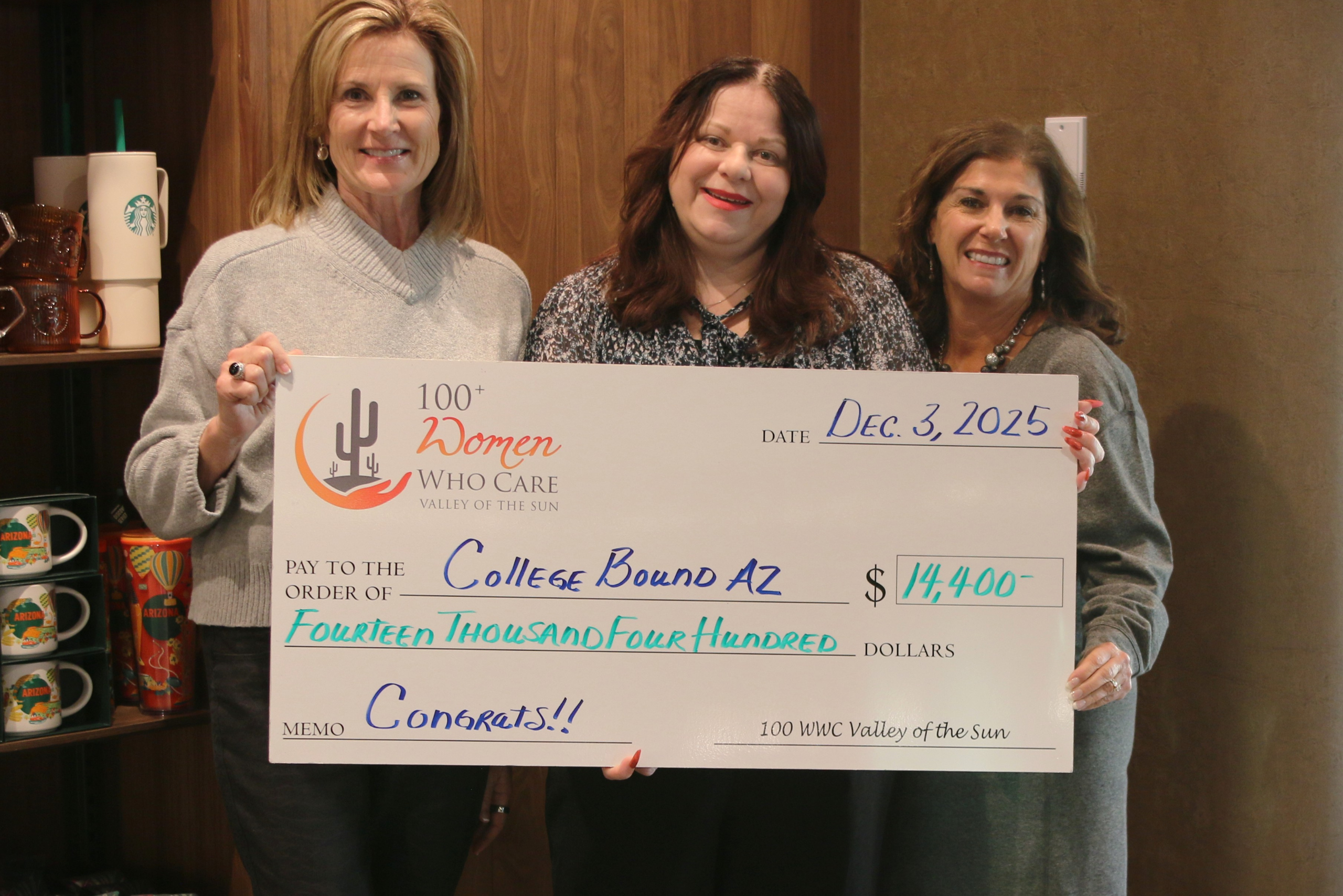 image of check presentation to charity recipient DSquared