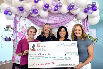 image of check presentation to charity recipient DSquared